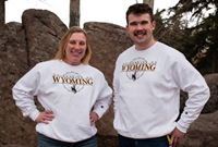 Champion® Distressed Reverse Weave University of Wyoming XL Est. 1886 Creneck
