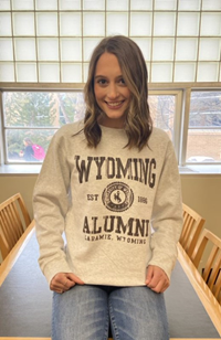 CI Sport® Crew Distressed Wyoming over Seal Est. 1886 Alumni