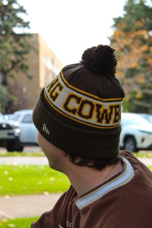 New Era® Wyoming Cowboys Stripe Pom Beanie