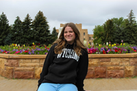 Champion® Distressed Wyoming Arch Reversed Weave Hoodie (143586091167) Champion® Distressed Wyoming Arch Reversed Weave Hoodie