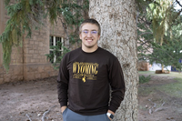 Champion® The University of Wyoming over Cowboys Est. Bucking Horse 1886 Long Sleeve Tee